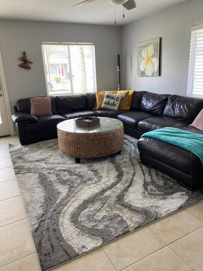 Living area - Walk to the beach, 2 bed, 2 bath, pet free, allergy free home, pool and hot tub (New Smyrna Beach)