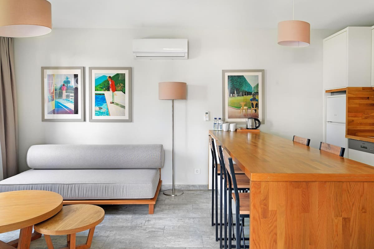 Executive Suite, 2 Bedrooms, Garden View | Premium bedding, in-room safe, desk, blackout drapes