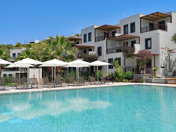 Outdoor pool, pool umbrellas, pool loungers