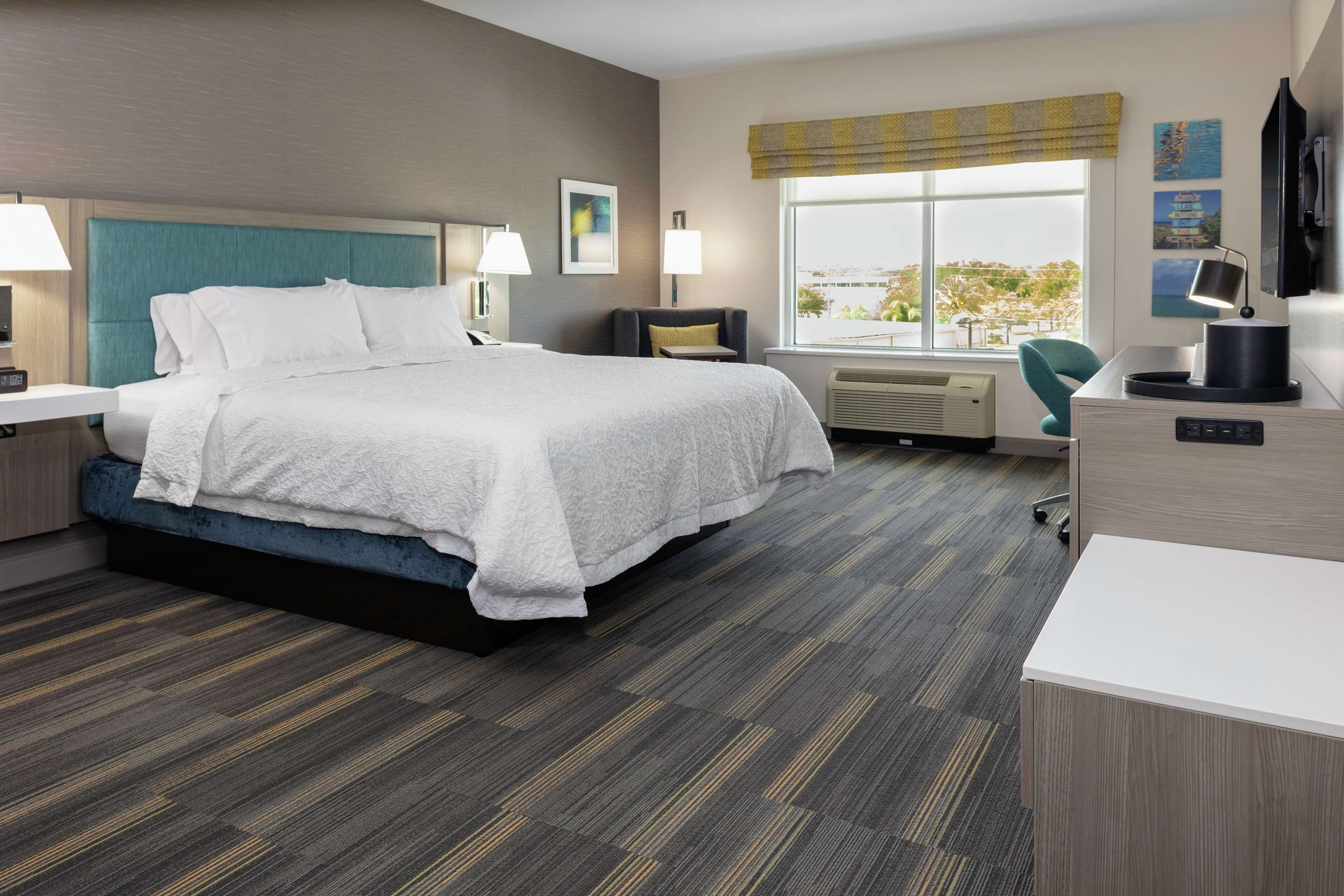 premium bedding, desk, laptop workspace, iron/ironing board