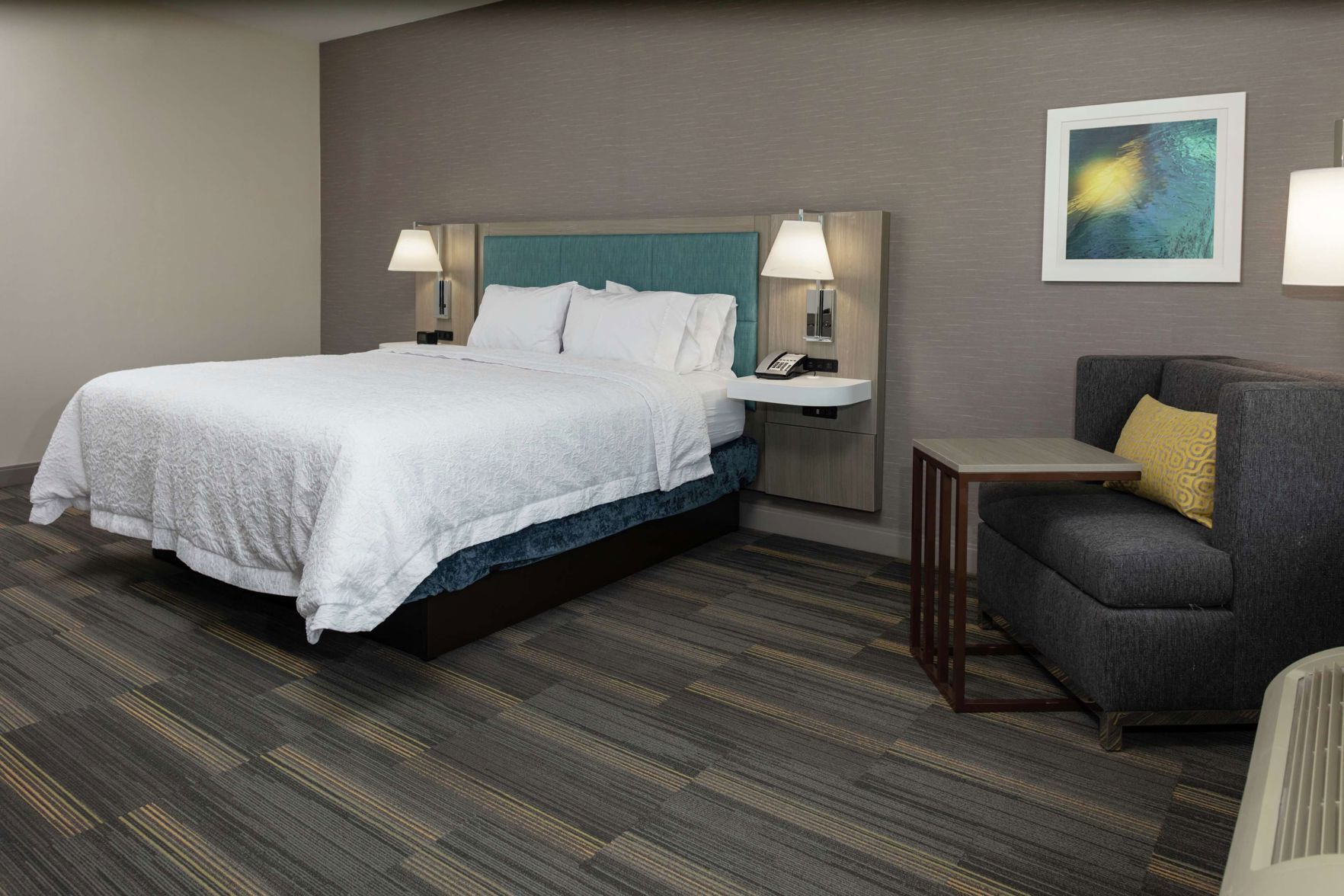 Premium bedding, desk, laptop workspace, iron/ironing board