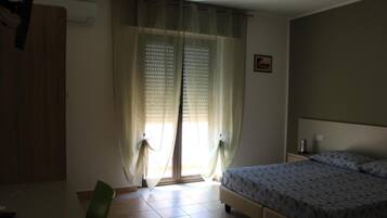 Desk, blackout curtains, iron/ironing board, cots/infant beds