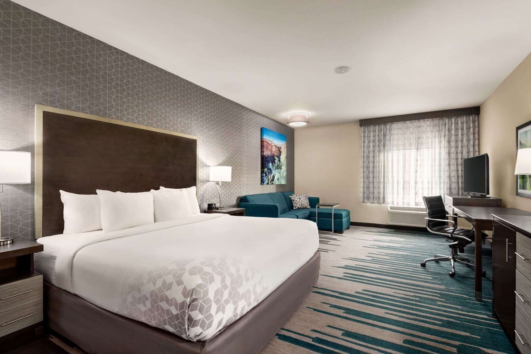 Premium bedding, pillow-top beds, desk, laptop workspace