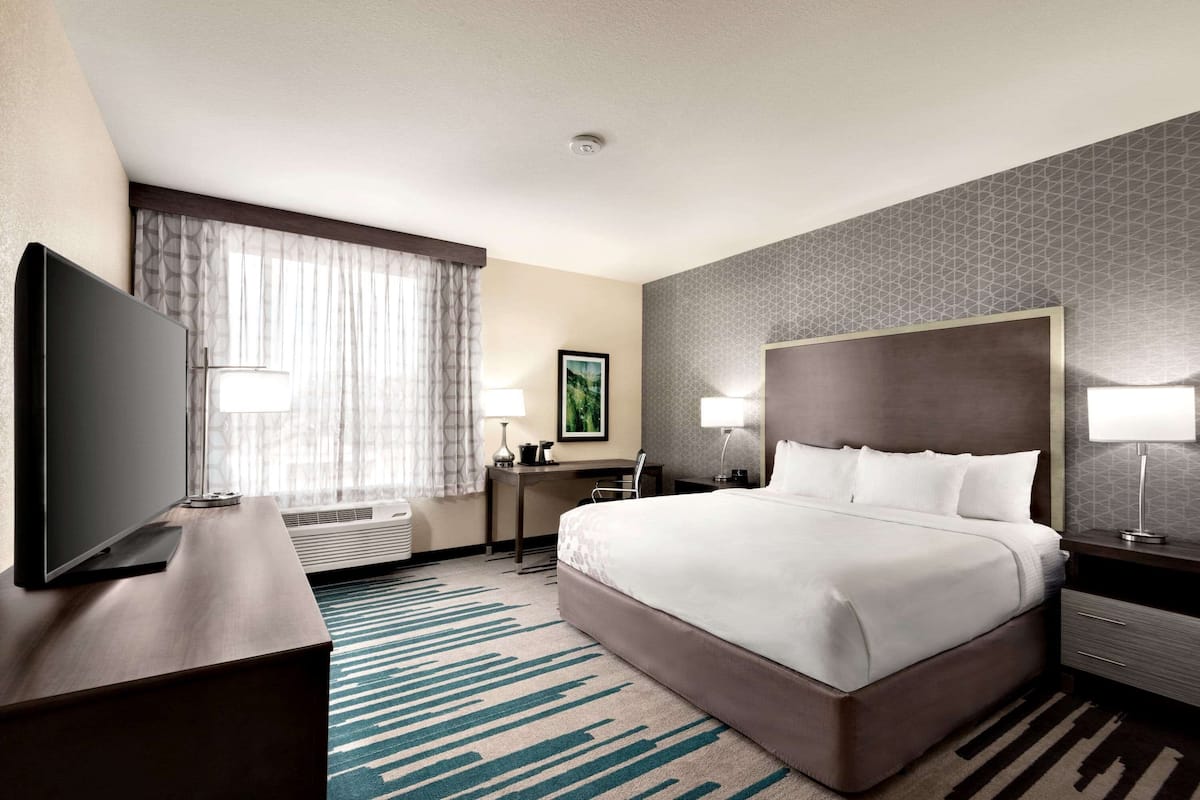 Premium bedding, pillow-top beds, desk, laptop workspace