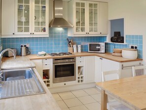Dishwasher, high chair, cookware/dishes/utensils
