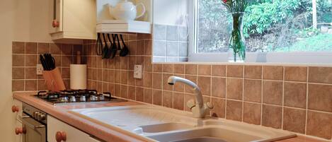 Dishwasher, highchair, cookware/dishes/utensils