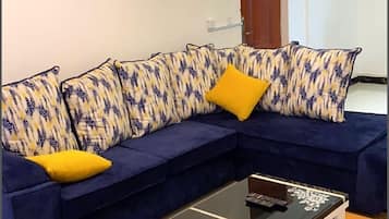 Superior Suite, 3 Bedrooms, Accessible | Living area | Flat-screen TV