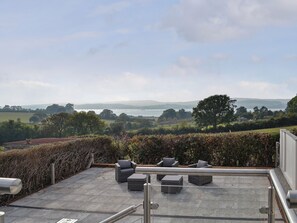 Wonderful paved terraced garden overlooking the River Exe | Estuary View, Exmouth