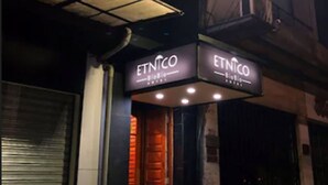 A hotel with a prominent 'HOTEL' sign and 'ETNICO' branding. - Etnico Bío Bío (Los Angeles)
