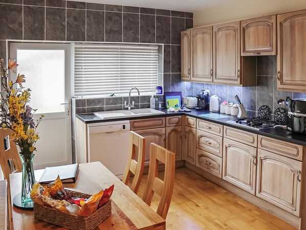 Dishwasher, highchair, cookware/dishes/utensils