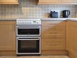 Dishwasher, high chair, cookware/dishes/utensils, freezer