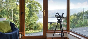 Look out over the sparkling loch and watch the abundant wildlife.