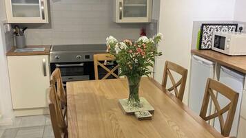 High chair, cookware/dishes/utensils, freezer