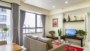 Deluxe-Apartment, 2 Schlafzimmer | Wohnbereich | LCD-Fernseher