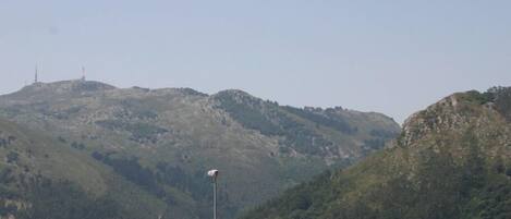 A mountainous landscape with a clear sky.