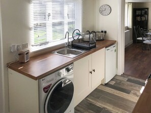 Highchair, cookware/dishes/utensils