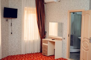 Minibar, strykejern/-brett og ekstrasenger (mot et tillegg)