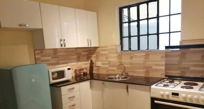 A three bed roomed fully furnished apartment Located in Kisumu Milimani estate.