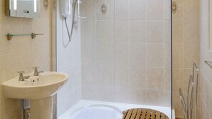 A modern bathroom with a glass-enclosed shower, a sink with two faucets, and a bathtub. - Low Cordorcan - UK5891 (Wood of Cree, near Newton Stewart)