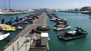 A marina with numerous boats docked along a wooden pier. - Apartment in Jawhara2 Marina Smir next to the beach with pool. (Tetuán)