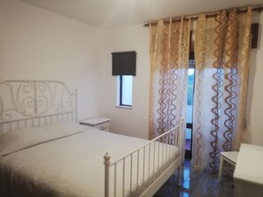 2 dormitorios, tabla de planchar con plancha, wifi gratis y ropa de cama