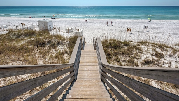 A wooden staircase leading to a beach with a clear view of the ocean. - 🏖️ Beach Service Included! | 750 ft to Beach | 4 BR | Villa Tuscana (Miramar Beach)