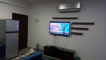 Chalet, 2 Bedrooms, Lagoon View | Living room | Flat-screen TV