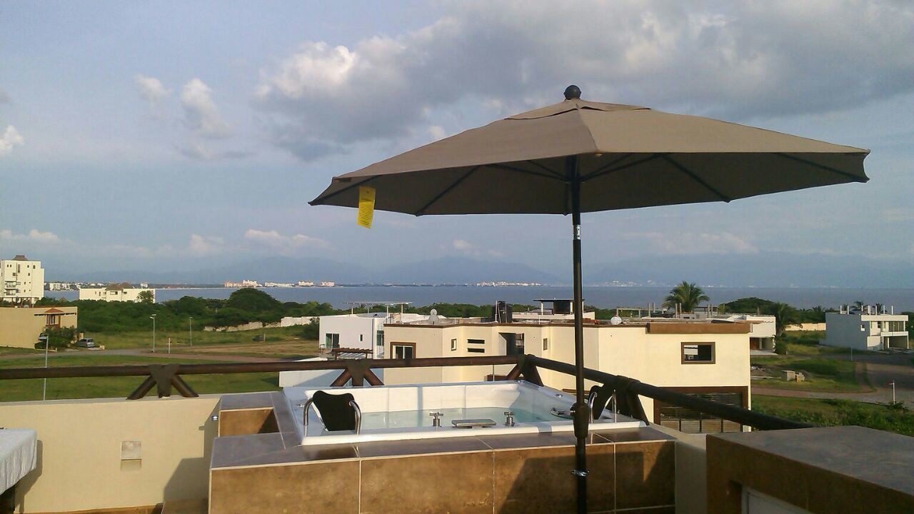 Casa familiar, varias camas, para fumadores, vista parcial al océano | Vista desde la habitación