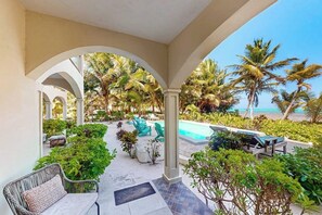 Terrace/patio - New oceanfront condo w/shared pool, dock, two kayaks, partial AC, strong WiFi (San Pedro)