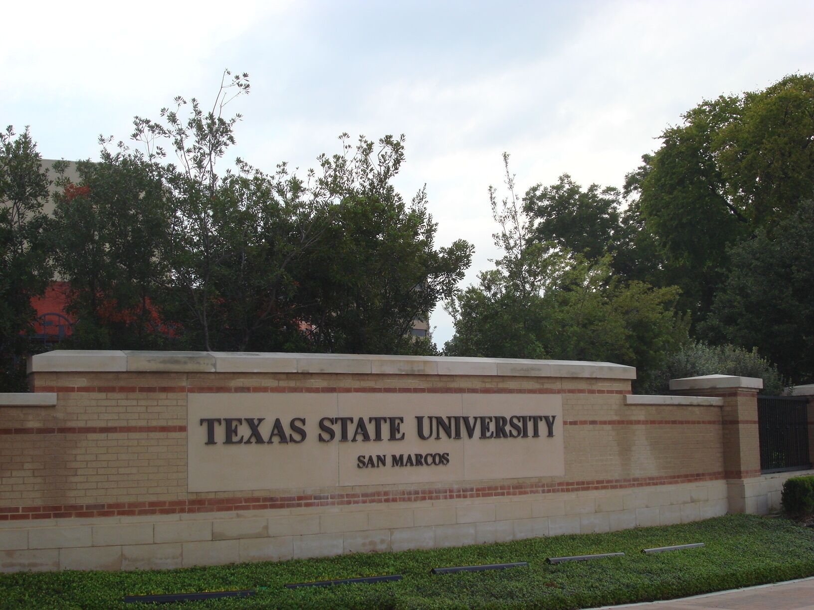 A sign for Texas State University San Marcos.