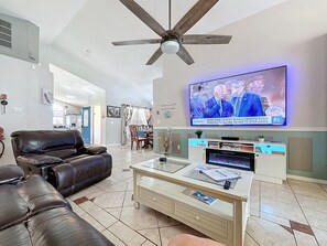 TV connectée, cheminée, jeux vidéo, livres