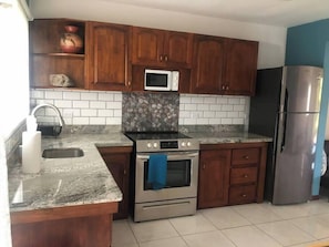 Fridge, microwave, oven, stovetop - Newly Remodeled Condo MS #1 With 200MB Internet (Coco)