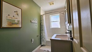 Combined shower/tub, hair dryer, towels, soap