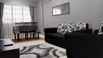 Royal Apartment, Multiple Beds, Accessible, City View | Living area | LED TV