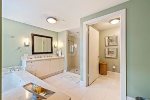 Bathtub, hair dryer, bidet, towels