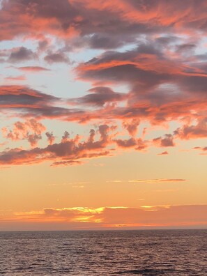 On the beach, sun loungers, beach towels