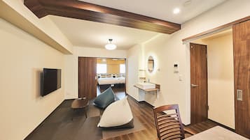 Family Condo, Non Smoking | Living area | Flat-screen TV, DVD player