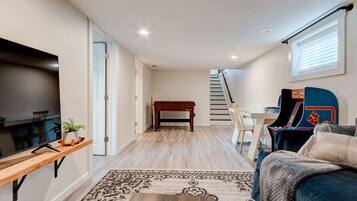 Smart TV, fireplace, foosball, toys