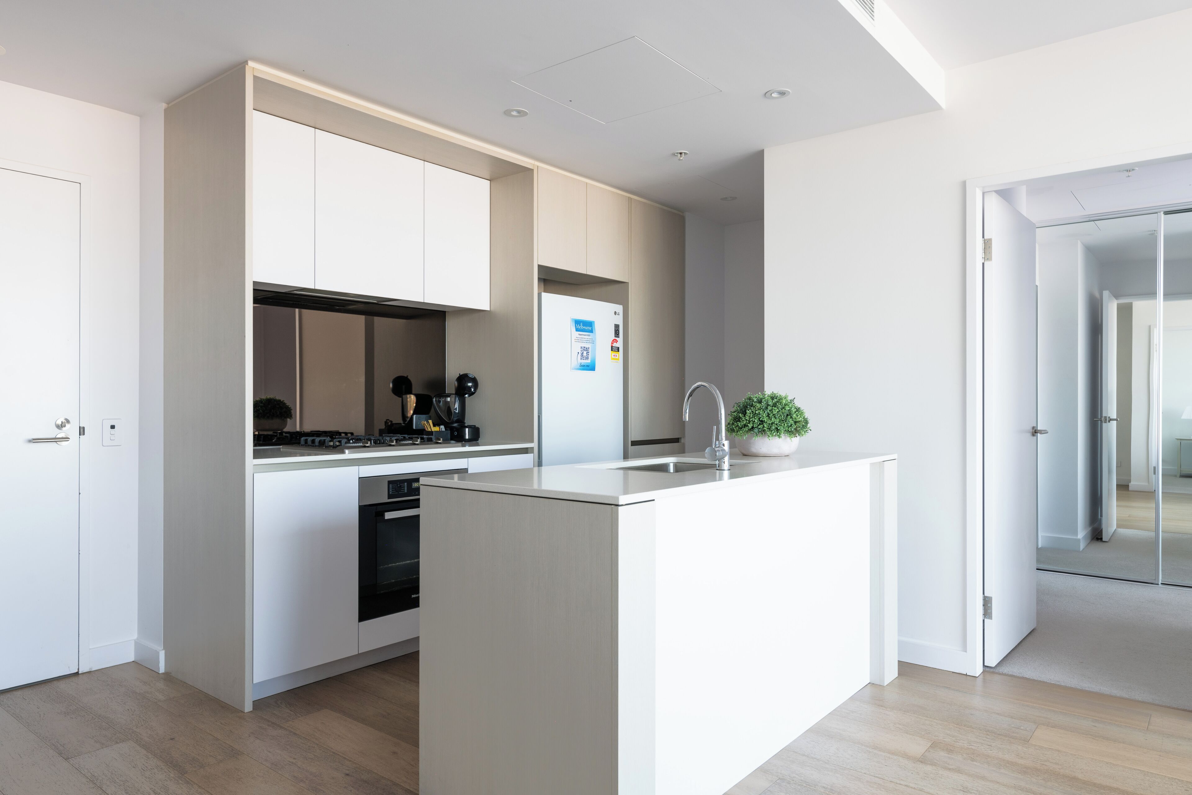 Two-Bedroom Two-Bathroom Apartment with Yarra Views | Private kitchen | Coffee/tea maker, full-size fridge, microwave, oven