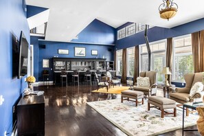 Sitting area with television. - Luxurious & secluded mansion and separate cabin with stunning ocean views! (Winter Harbor)