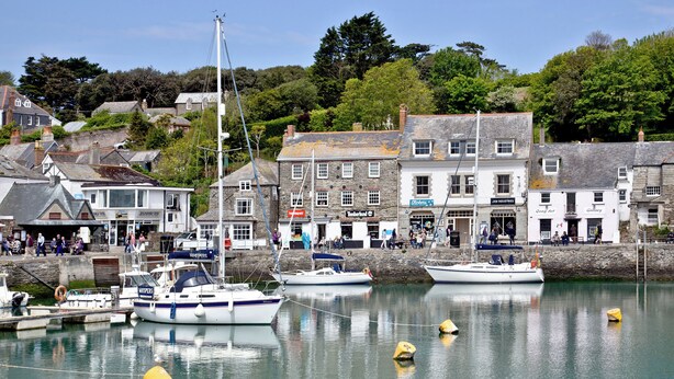 A harbor with boats, a building with a sign 'Timberland,' and a 'Quay Art Gallery.' - Trevistas, Padstow, Cornwall (Padstow)