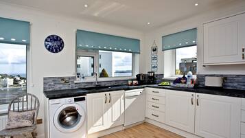 Dishwasher, high chair, cookware/dishes/utensils