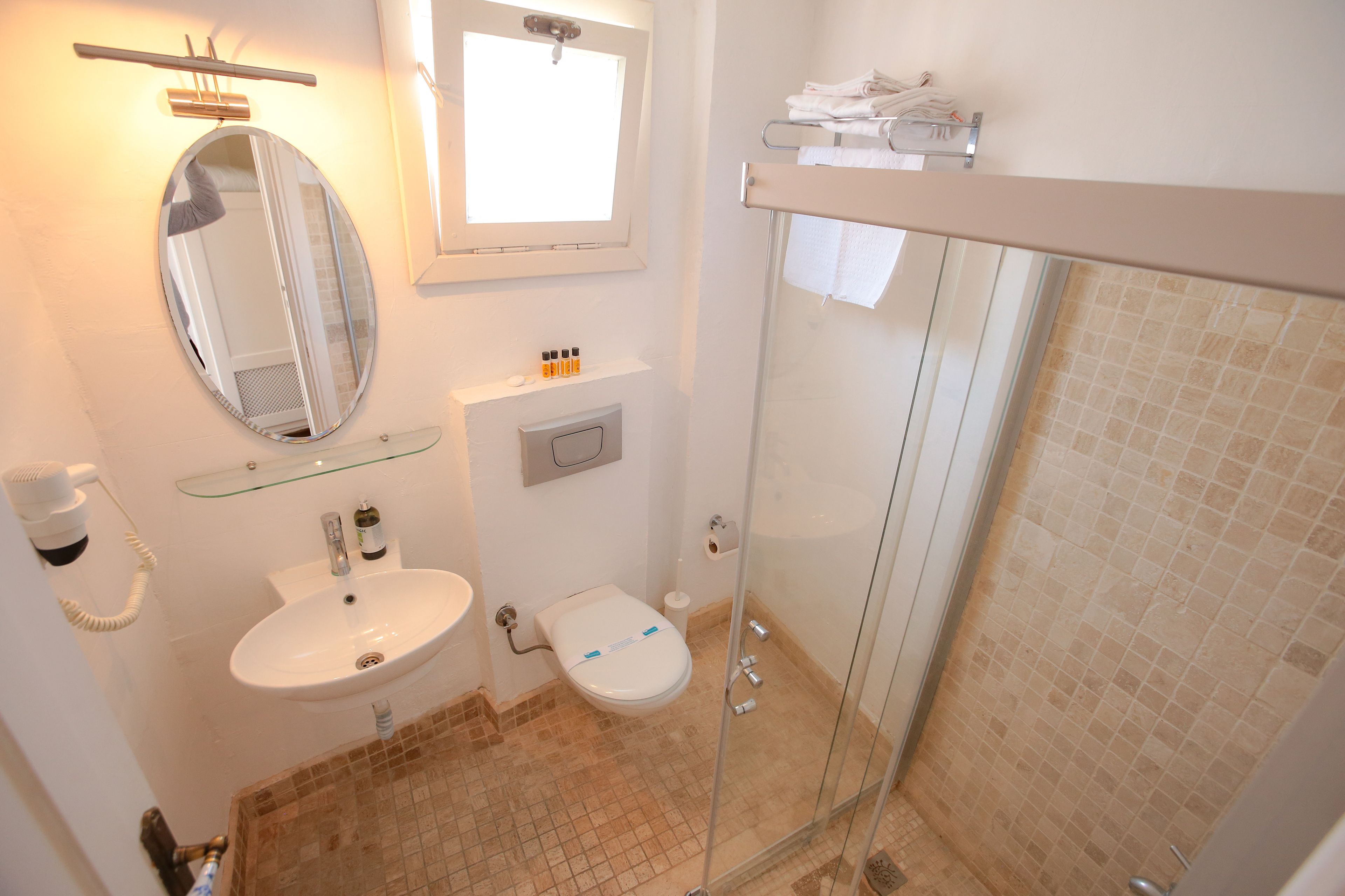 shower, free toiletries, hair dryer, slippers