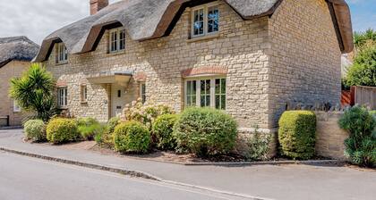 A charming yet contemporary thatched cottage close to Lulworth Cove.