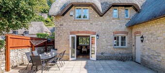 A charming yet contemporary thatched cottage close to Lulworth Cove.