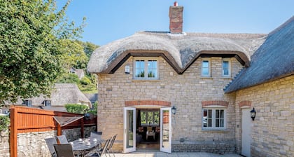 A charming yet contemporary thatched cottage close to Lulworth Cove.