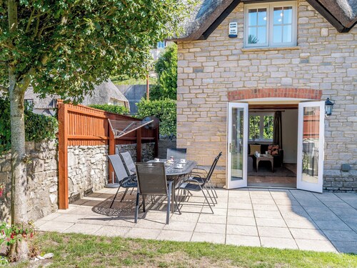 A charming yet contemporary thatched cottage close to Lulworth Cove.