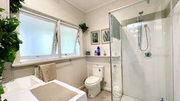 Shower, hair dryer, towels, soap