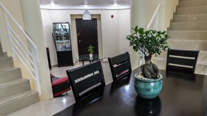 ห้องดีลักซ์, เตียงเดี่ยวขนาดใหญ่ 1 เตียง, ปลอดบุหรี่, วิวทะเล | บริเวณนั่งเล่น