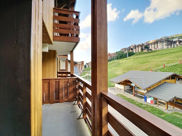 Enjoy a balcony with a view of the surrounding residential area.